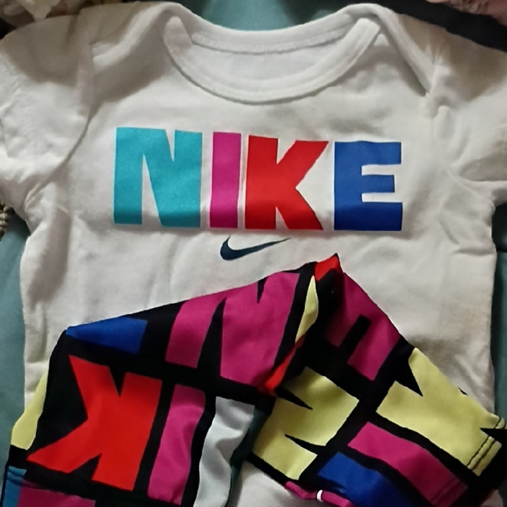 Nike White Baby Tee with Multi-Color Logo